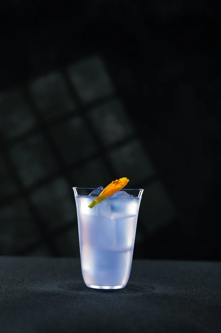 Verre Reflet du Corail en cristal, aux nuances corail et orangées, idéal pour créations fruitées